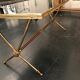 Golden brass table and lion heads circa 1950