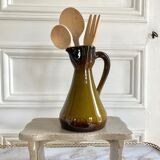 Set of three glazed ceramic pitchers