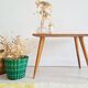 Antique coffee table with compass legs