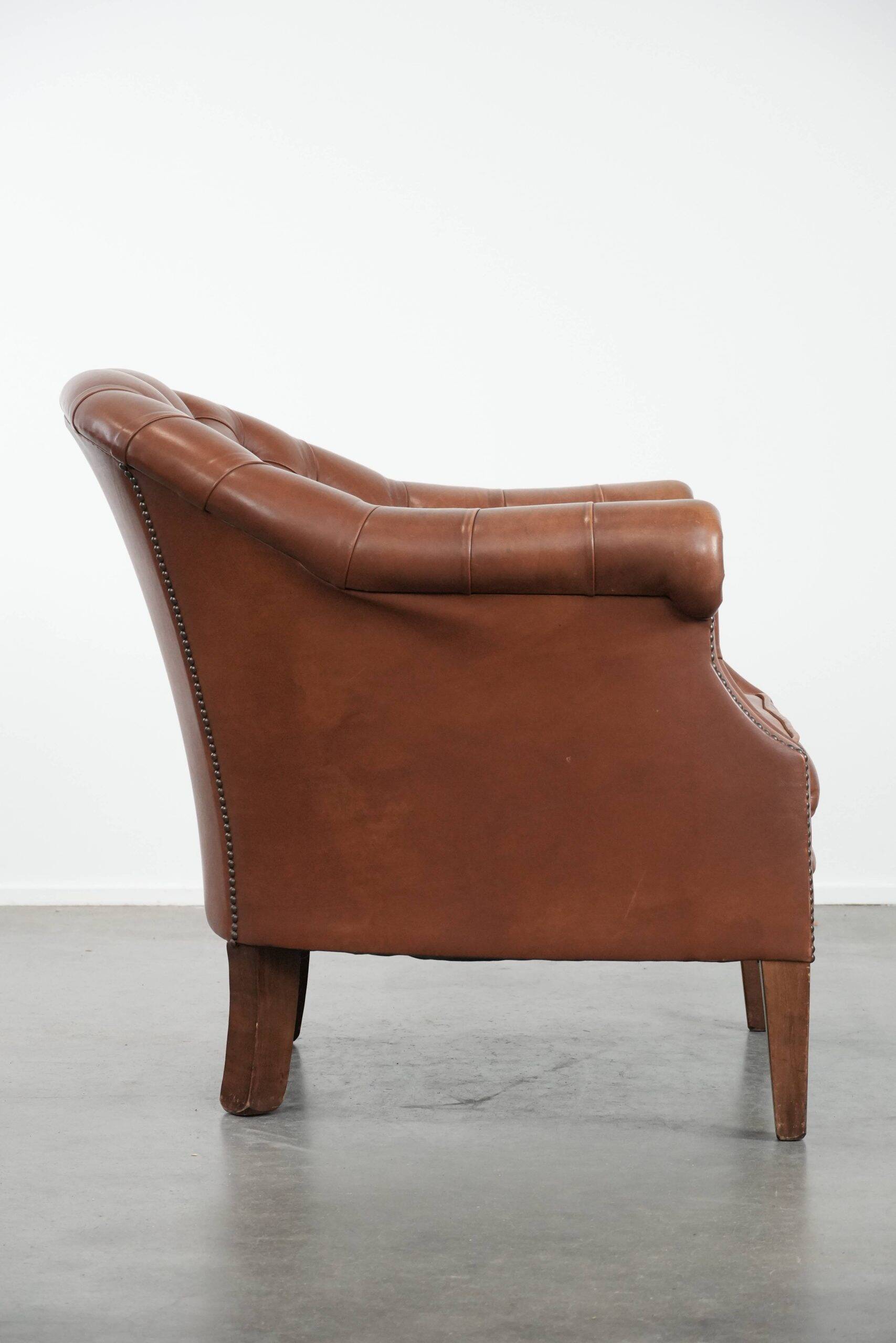 Chesterfield club armchair made of cowhide leather in English style