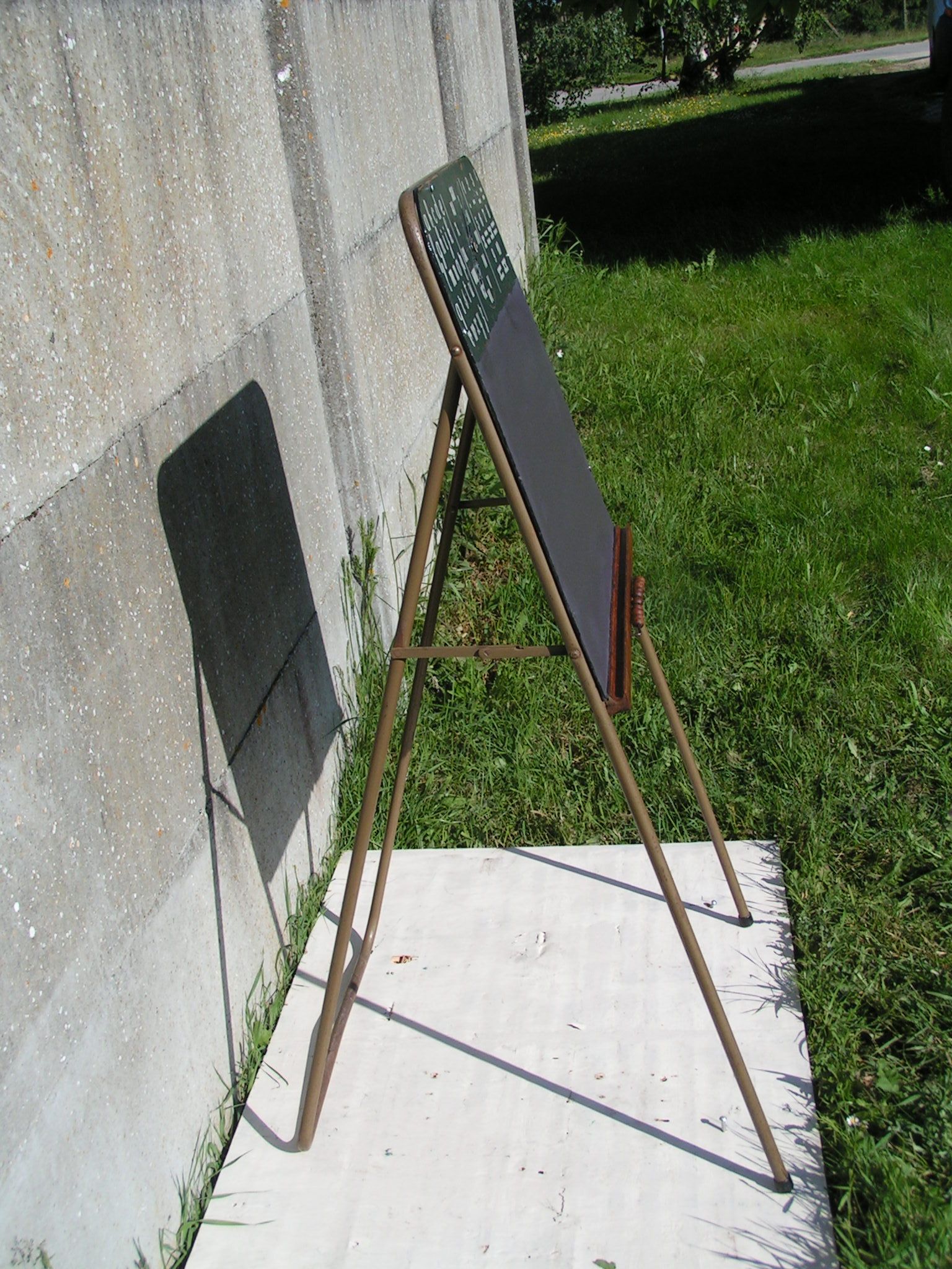 Schoolboy painting with abacus and rapose chalk metal feet