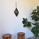 Miroir brutaliste losange en fer