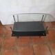 Vintage coffee table from the 1960s, glass, faux leather, brass.