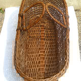 Old braided wicker couffin