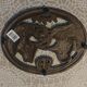 Taurus cast iron table mat