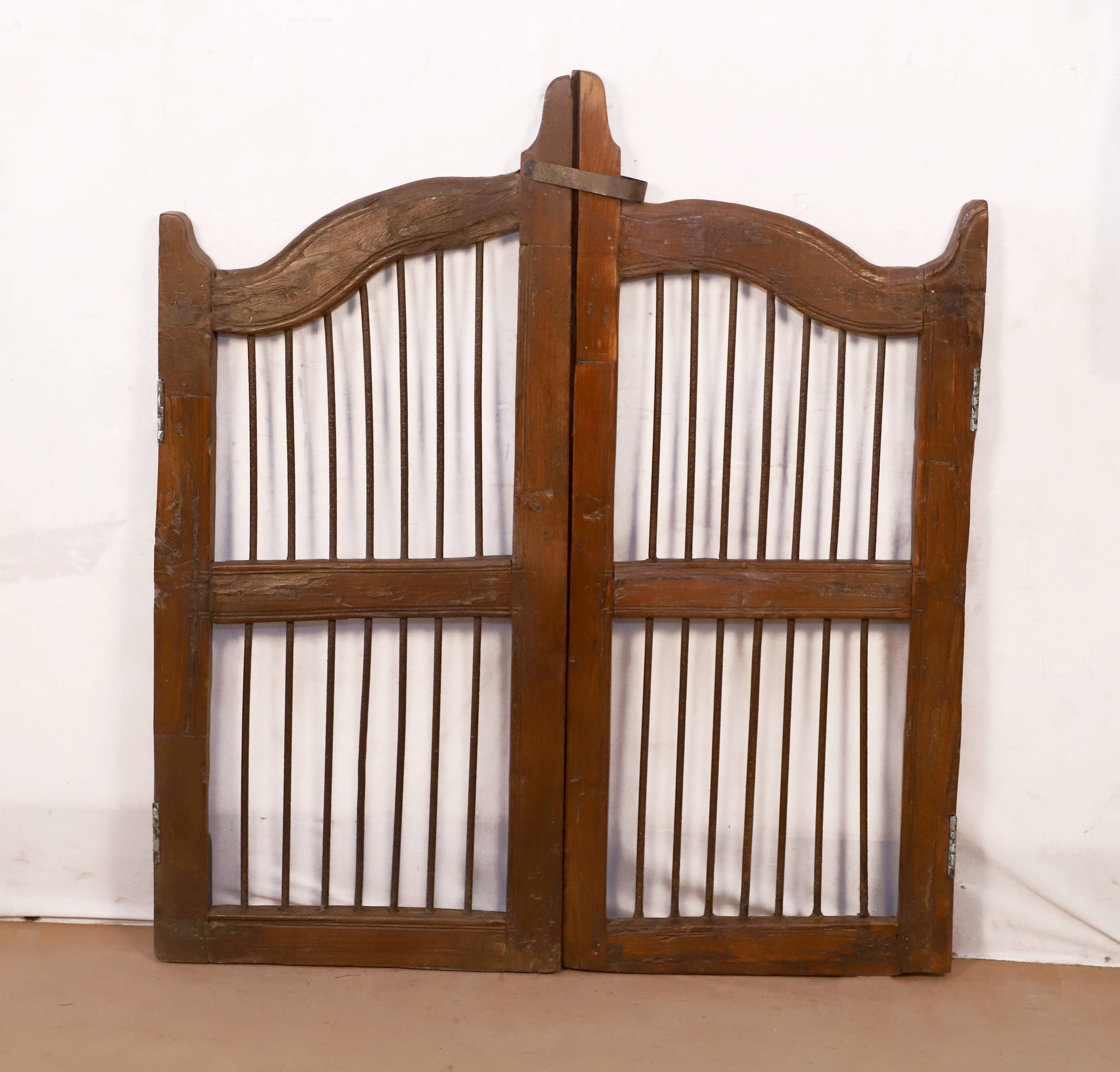 Old Burmese teak gate with openwork wrought iron panels