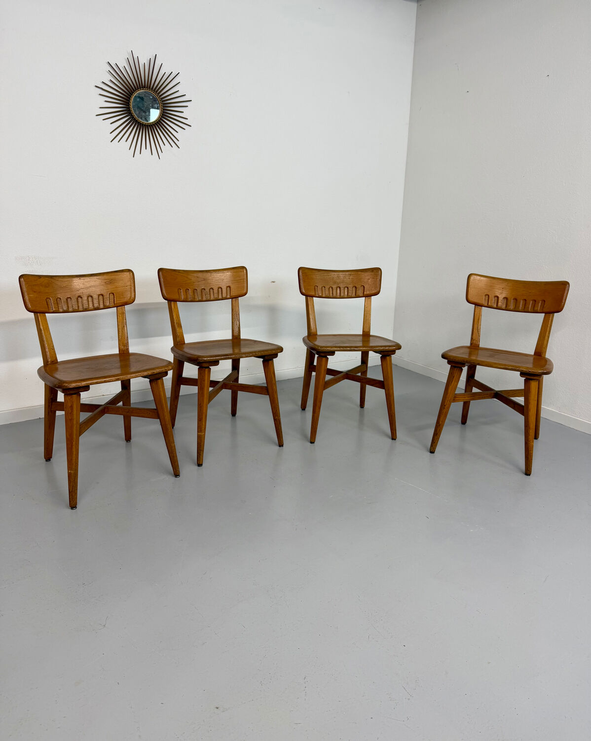 Set of 4 vintage solid oak chairs, 1960s design with sculpted backrest.
