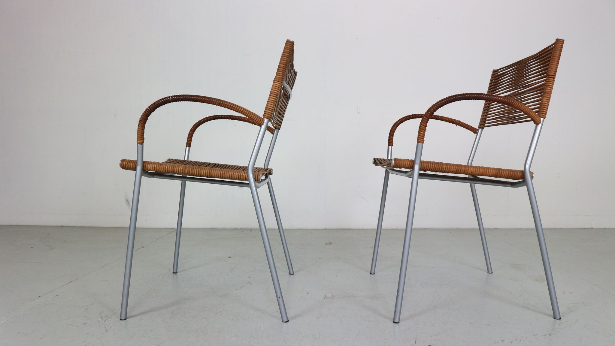 Set of 2 leather Mis B2 RVS armchairs by Tito Agnoli  for Pierantonio Bonacina