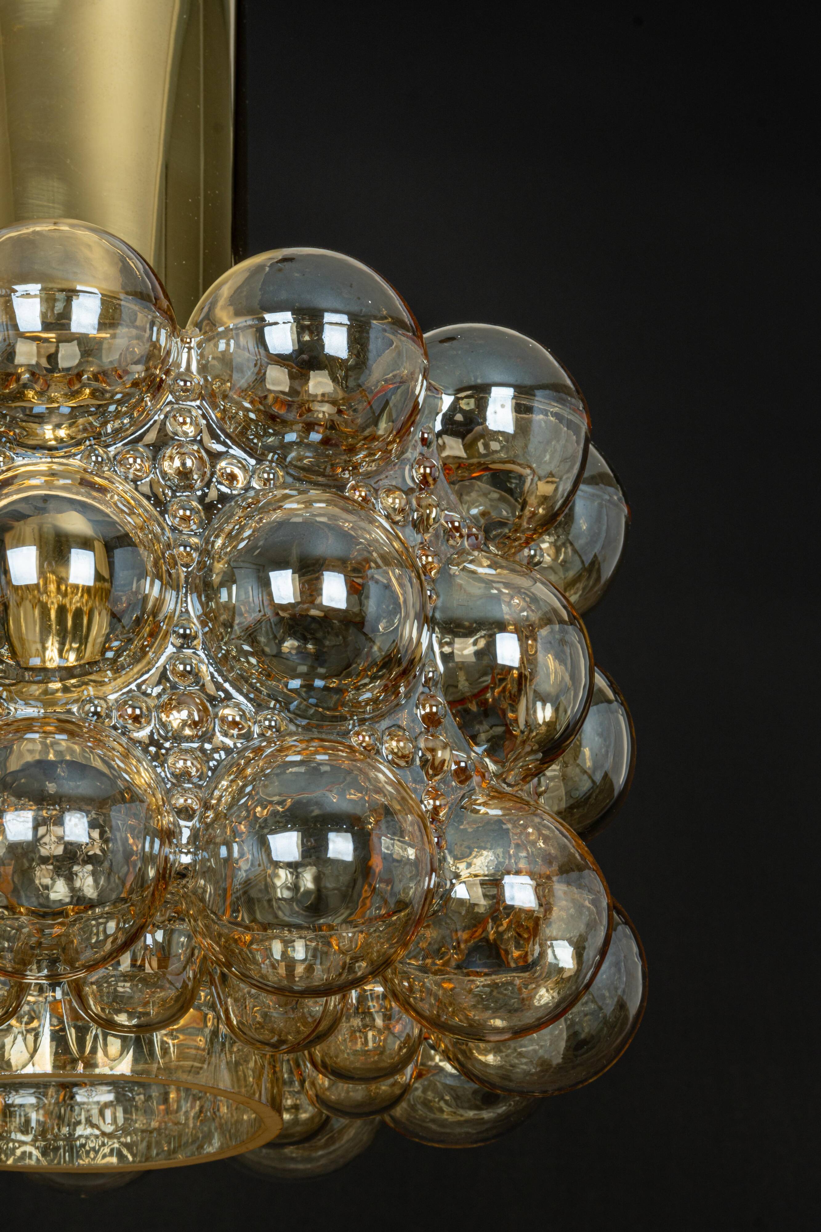 Large amber bubble glass pendant by Helena Tynell for Limburg, Germany, 1970s.