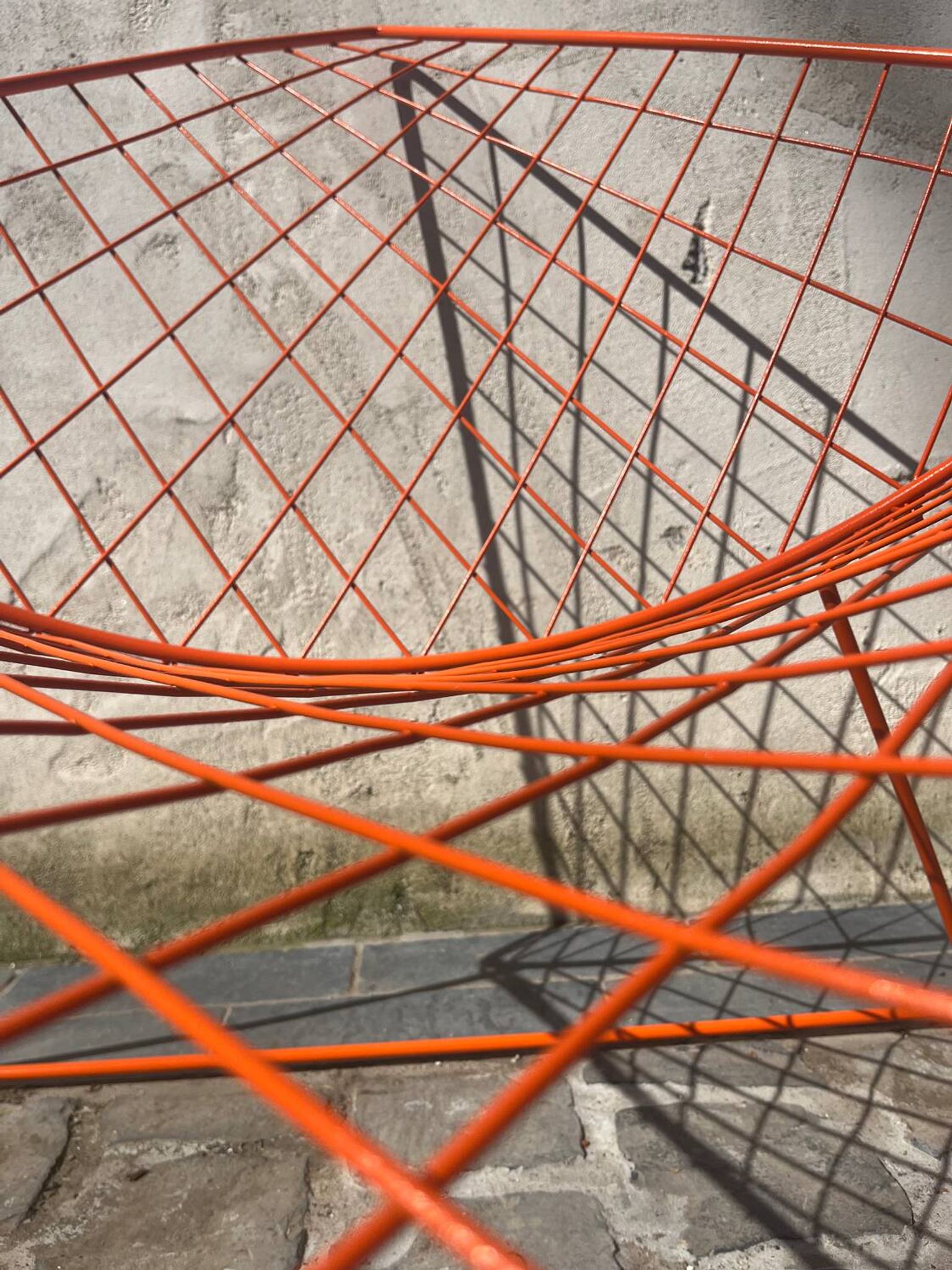 Orange lattice armchair
