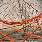 Orange lattice armchair