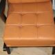 Paire de fauteuils vintage années 50 en bois noir et cuir caramel