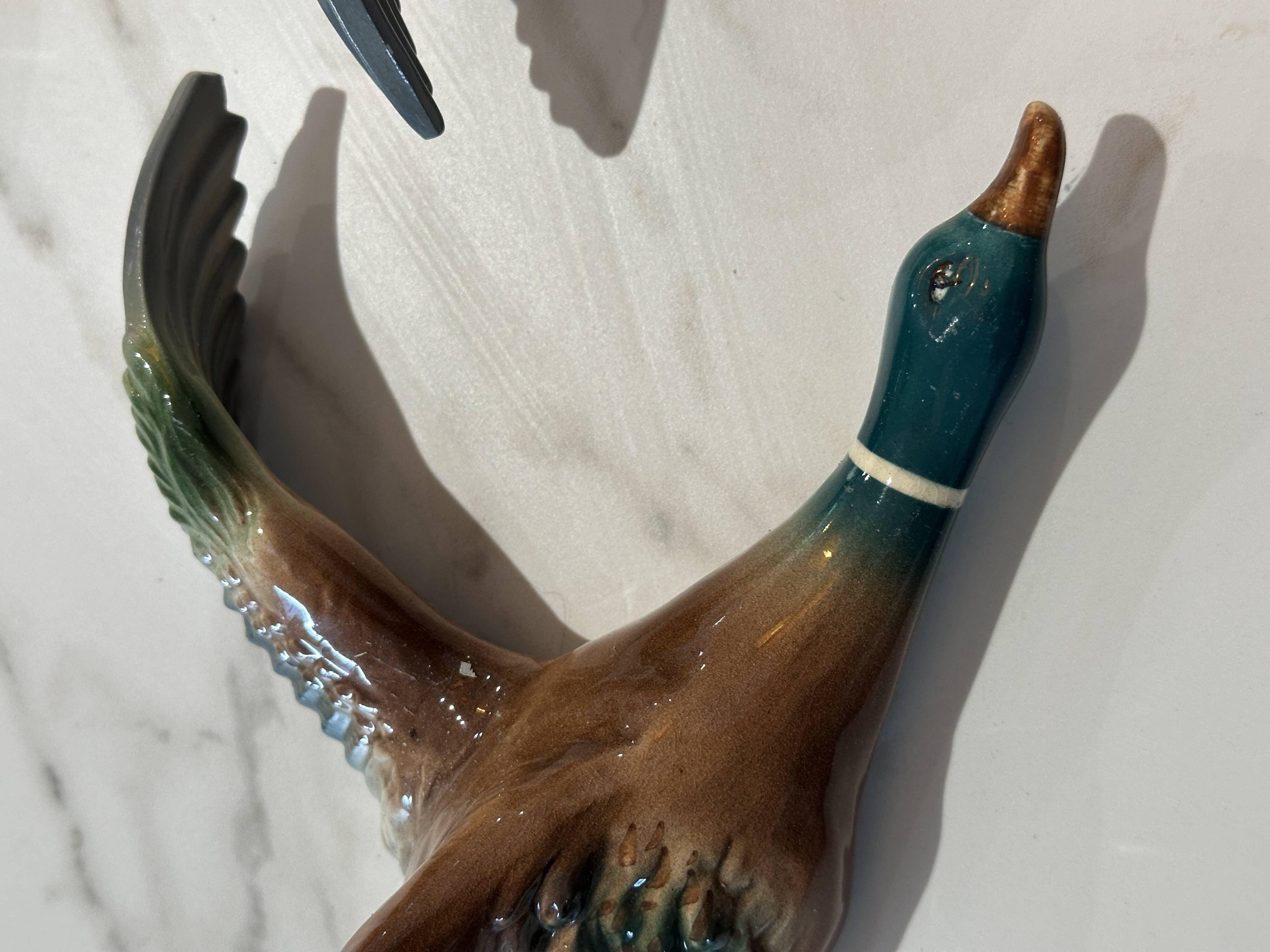 Mid century graduating flying ducks