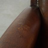 Vintage sheepskin armchair with beautiful warm colors and excellent seating comfort