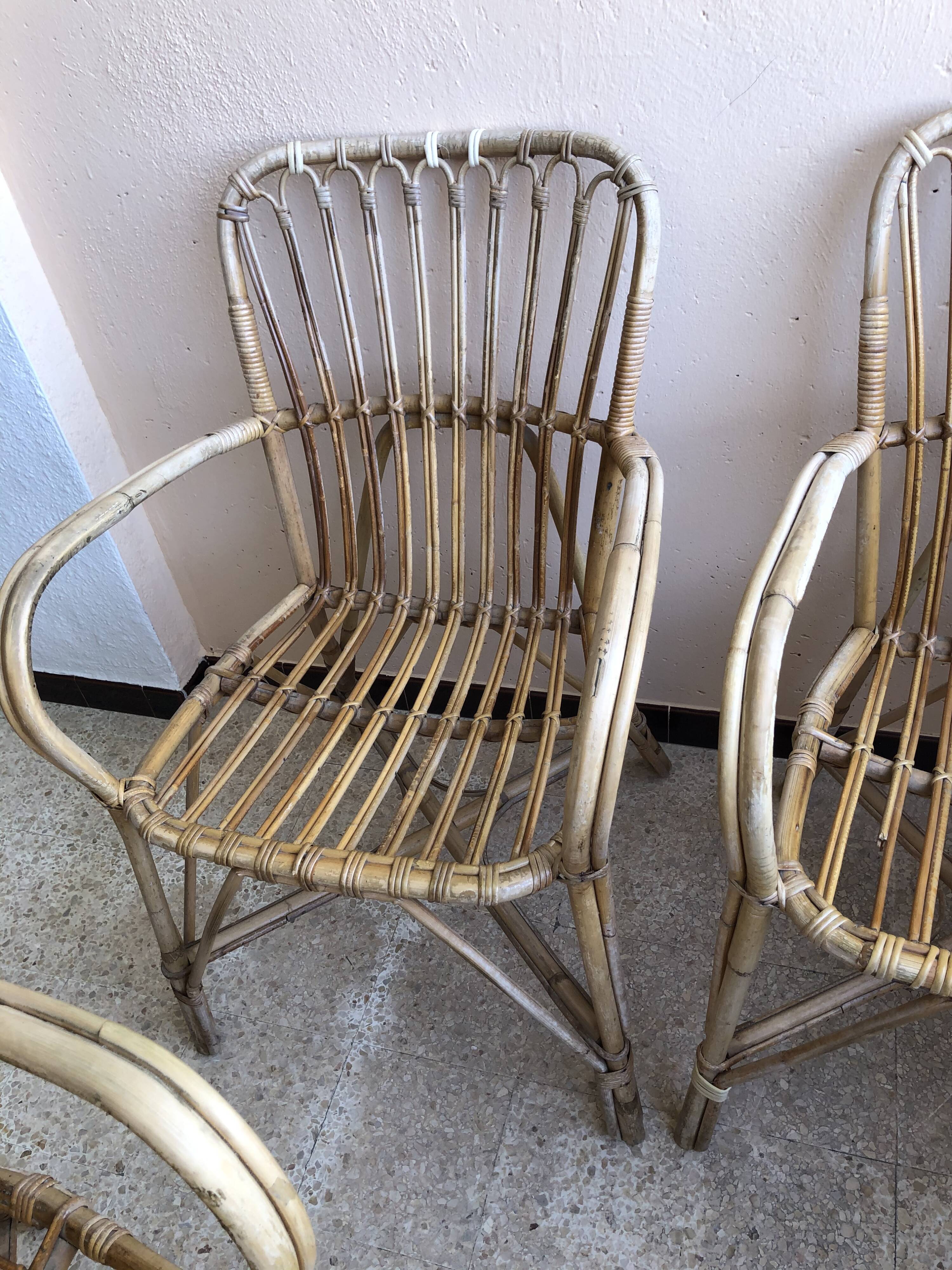 Series of 4 vintage rattan armchairs