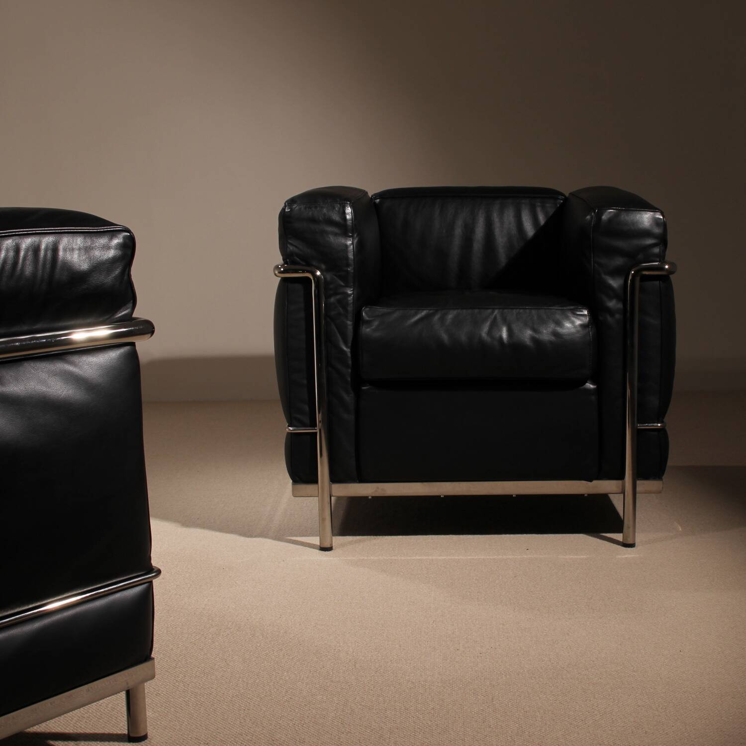 Two ‚LC2‘ Armchairs by Le Corbusier, P. Jeanneret, C. Perriand for Cassina