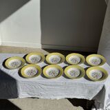 Set of 9 large vintage yellow deep plates with pink flowers and a gold rim.