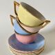 4 tasses à café en faïence couleurs pastel