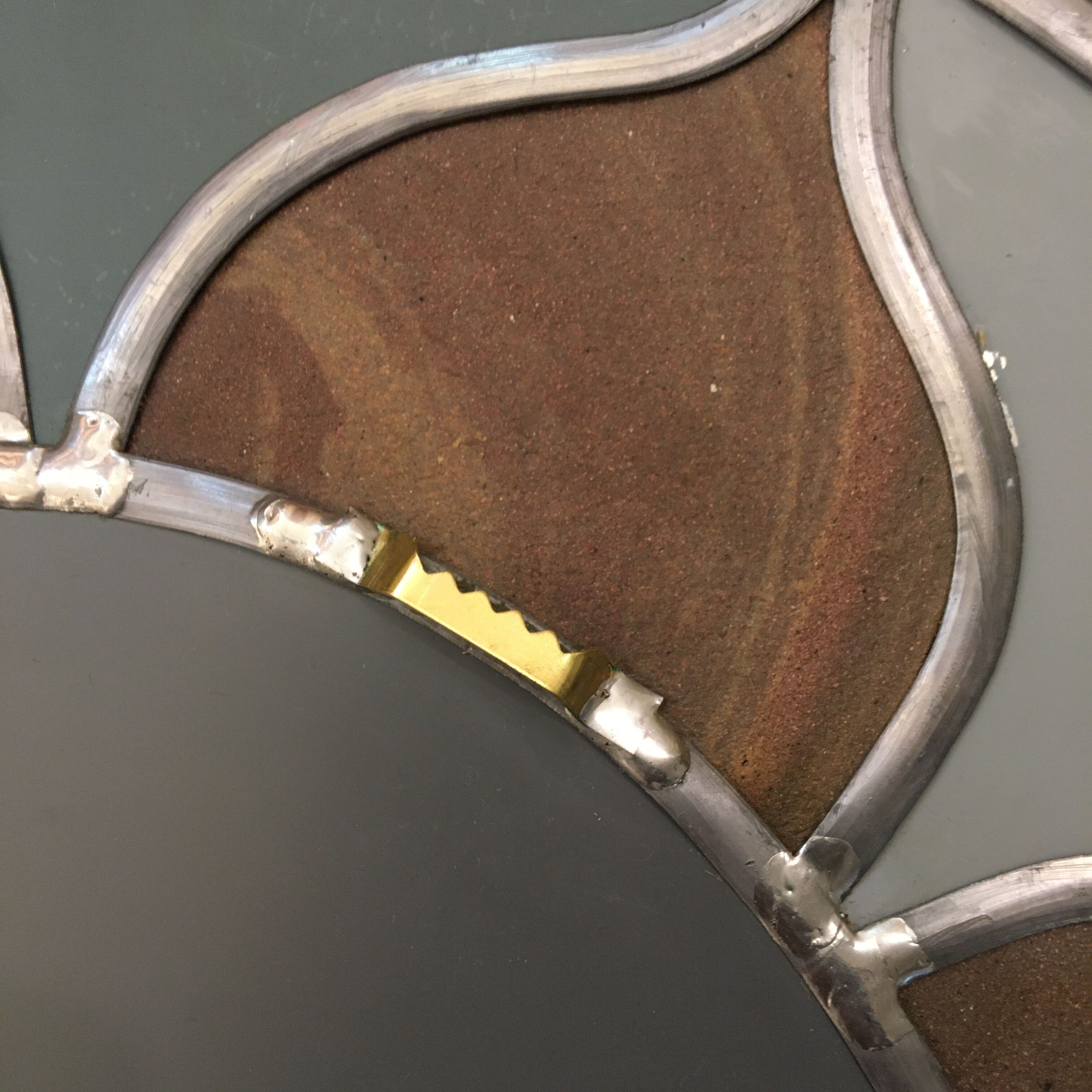 Mirror sun stained glass and ceramic inclusions