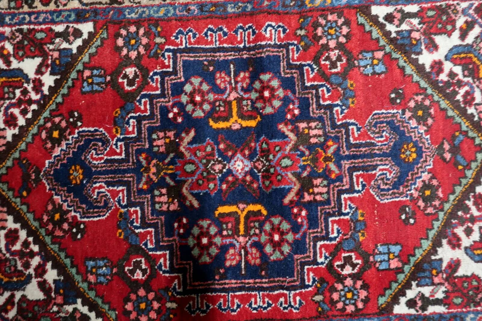 1950s handmade wool medallion rug, red and navy, 96 × 144 cm - 1C1290