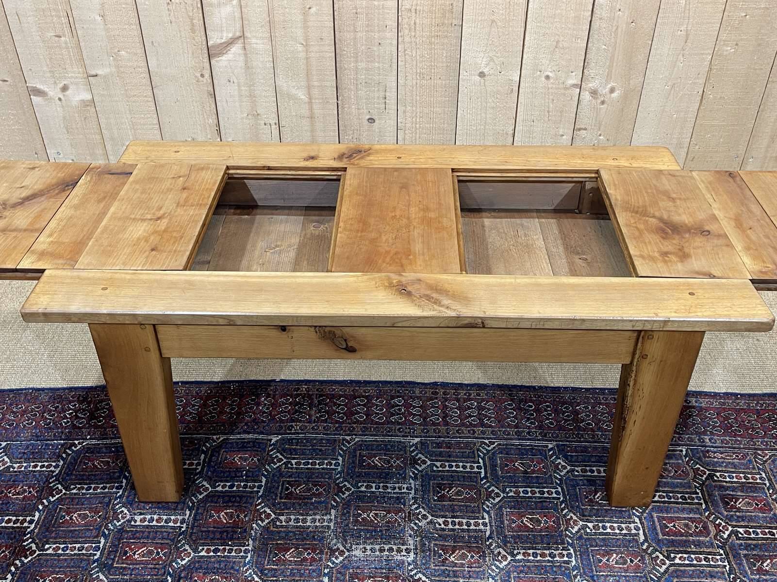 Cherry wood coffee table with sliding top, work from the 70s