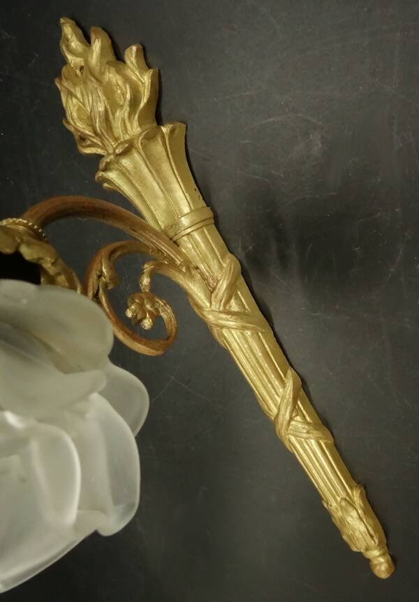 Pair of single-light wall sconces in the Louis XVI torch style - gilded bronze