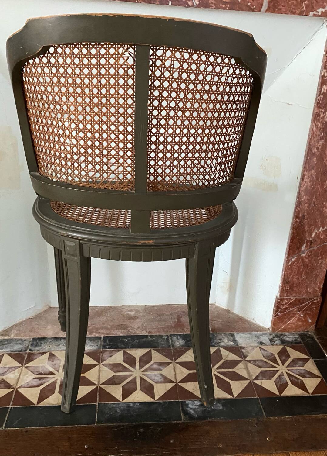 Caned armchair in Louis XVI style