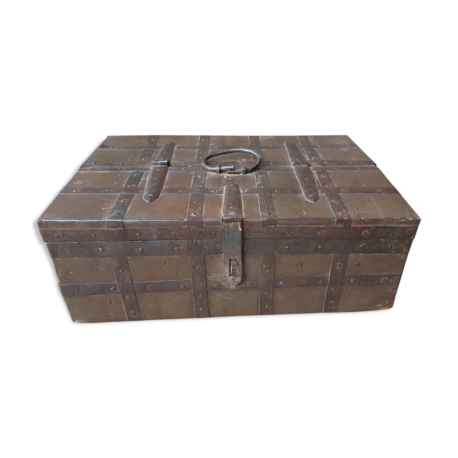 Old tribal chest in hammered metal