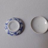 Porcelain pill box decorated with blue and white flowers