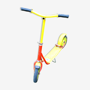 Vintage scooter in red and yellow metal 1960-1970