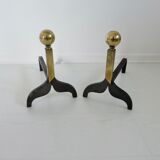 Pair of modernist steel and brass andirons