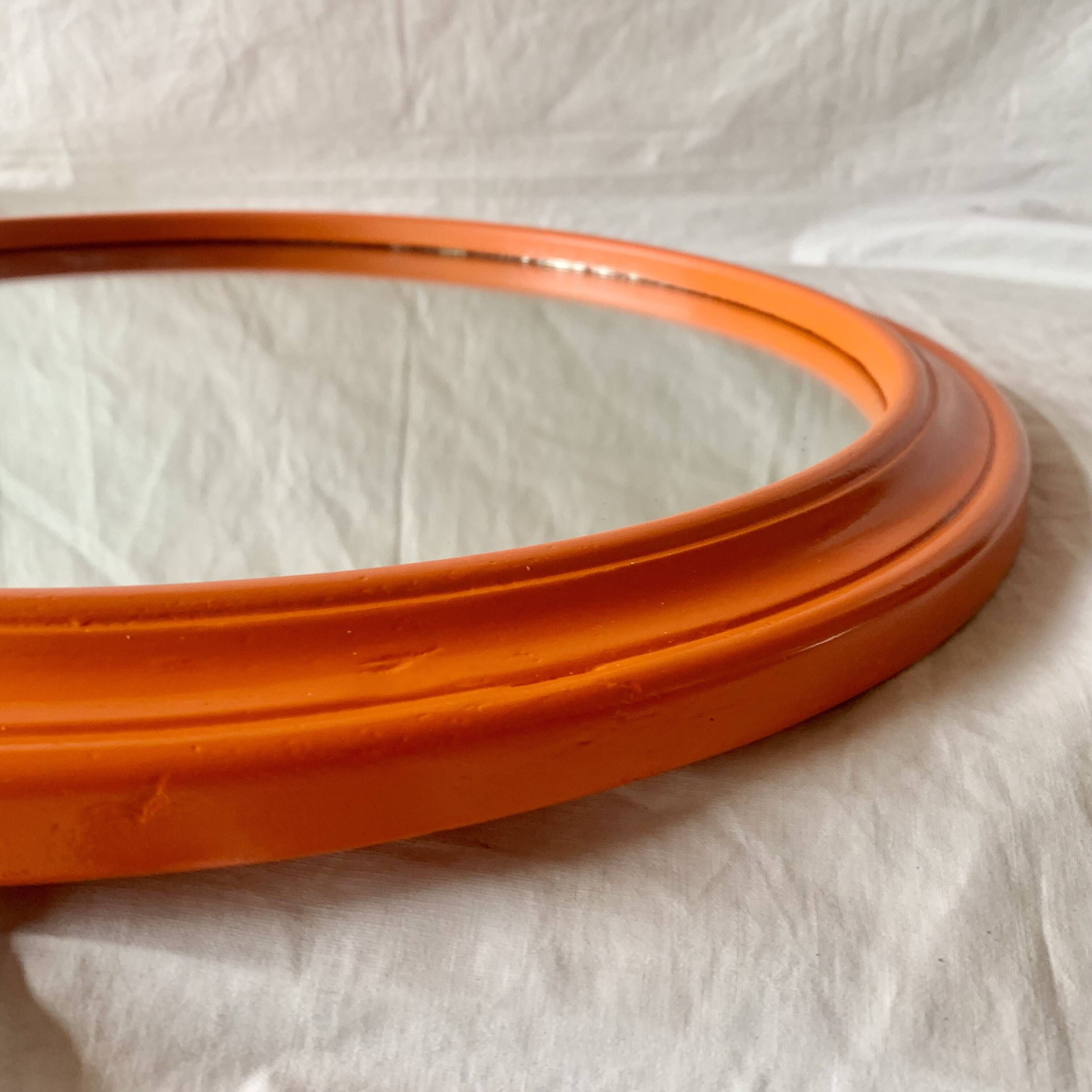 Vintage round wall mirror in orange painted wood - diameter: 48 cm