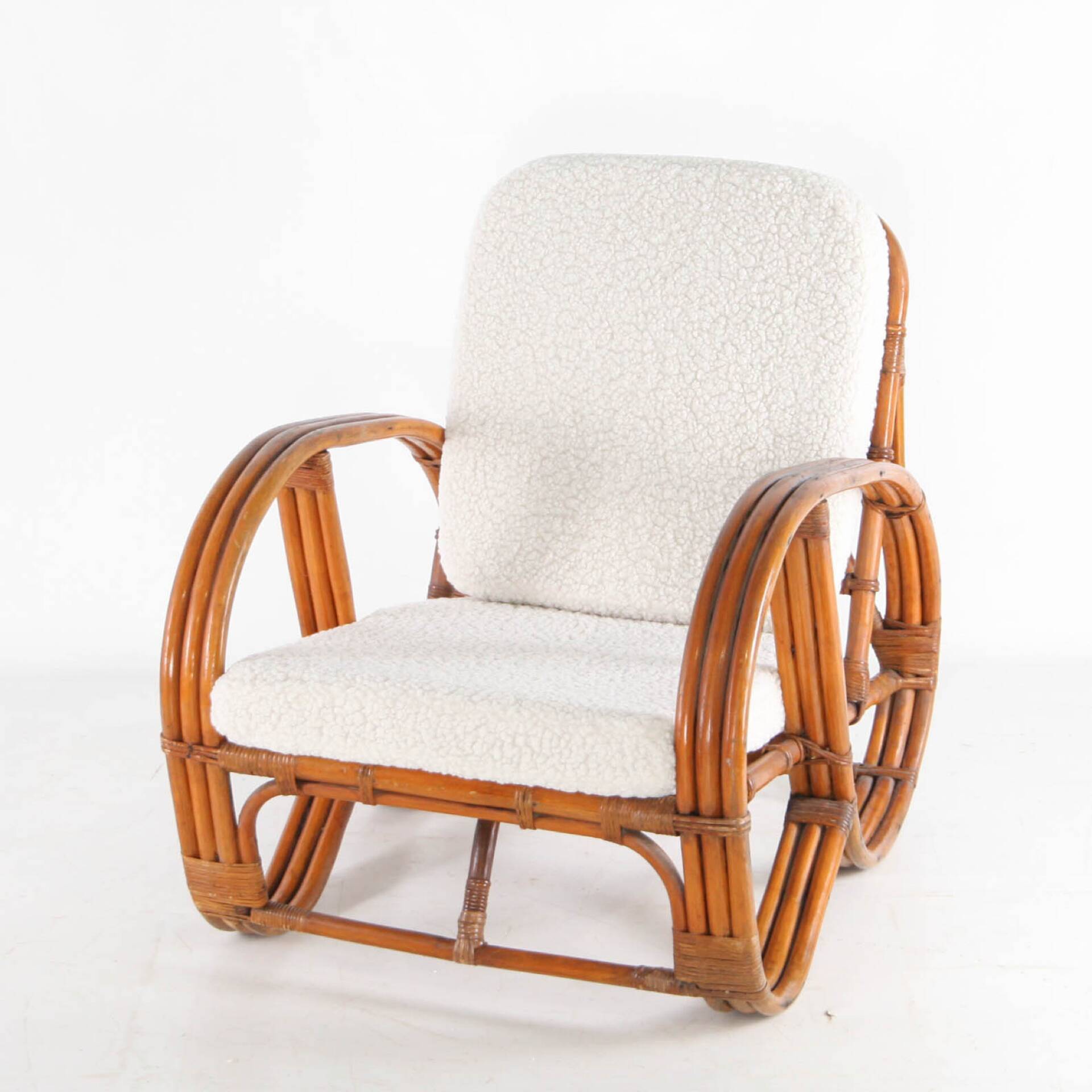 "Bretzel" armchair in rattan