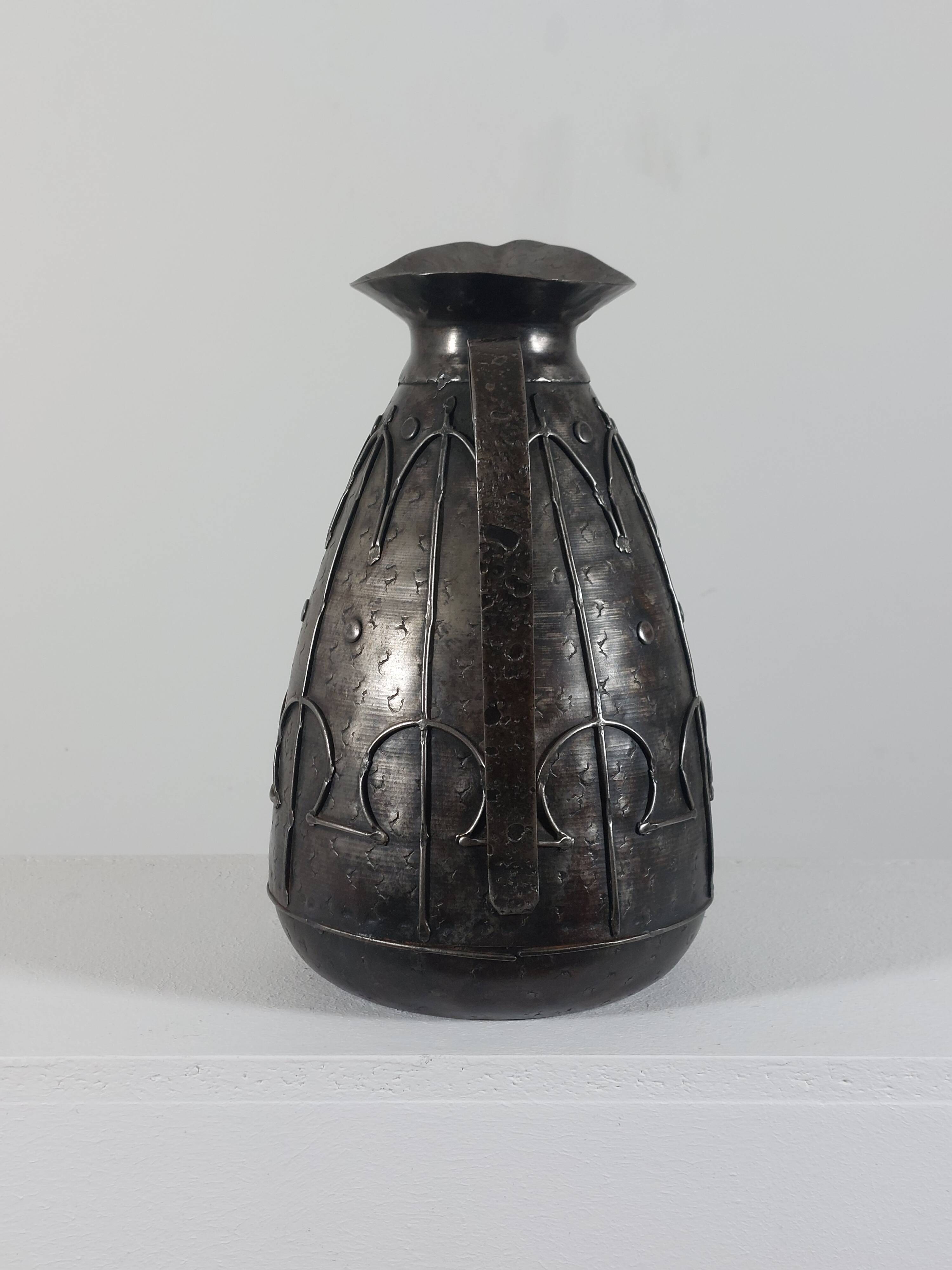 Rare hand-forged metal pitcher and craftsmanship from France.