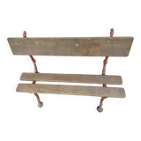 Bench with cast iron legs and branch decor