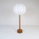 Mid-century solid teak table lamp from the 1960s Sweden.