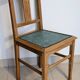 Revisited antique chair in solid wood with a sage green seat.