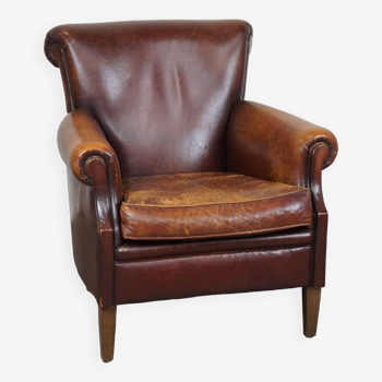 Rugged and Worn but Very Comfortable Sheepskin Leather Armchair with Beautiful Patina