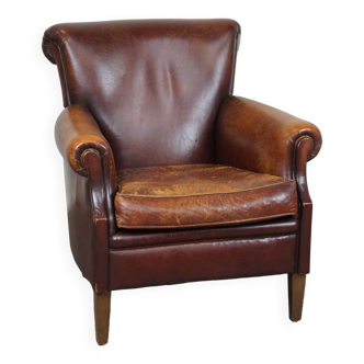 Rugged and Worn but Very Comfortable Sheepskin Leather Armchair with Beautiful Patina