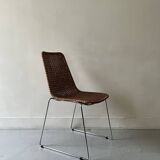 Chair made of rattan, wicker and chrome-plated metal
