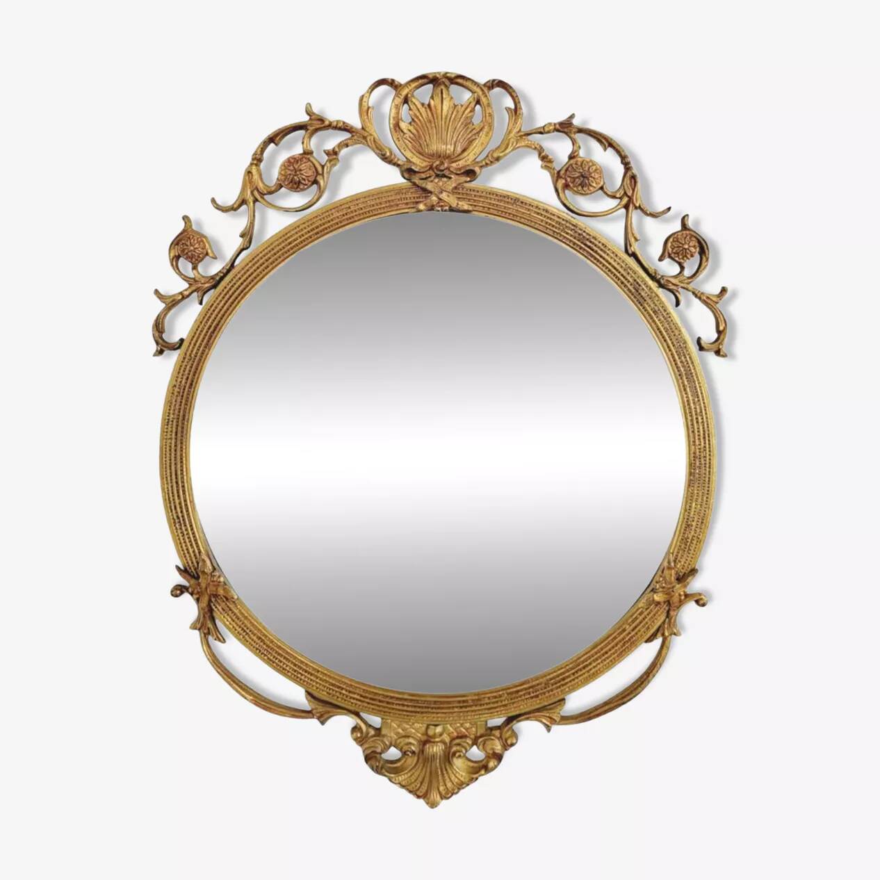Round brass medallion style mirror