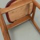Chaise vintage avec simili cuir rouge