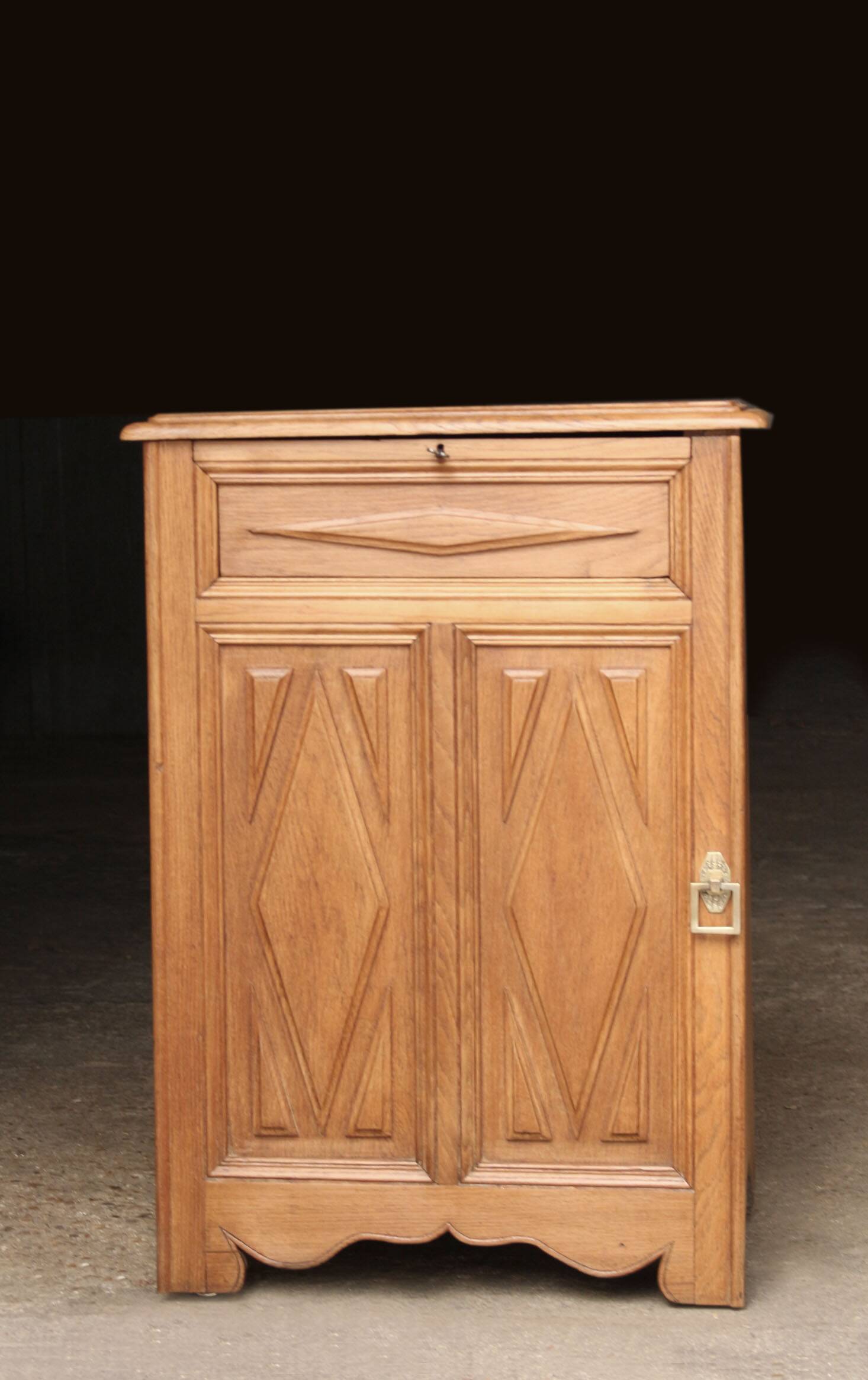 Art Deco jam cupboard in solid oak (circa 1930).
