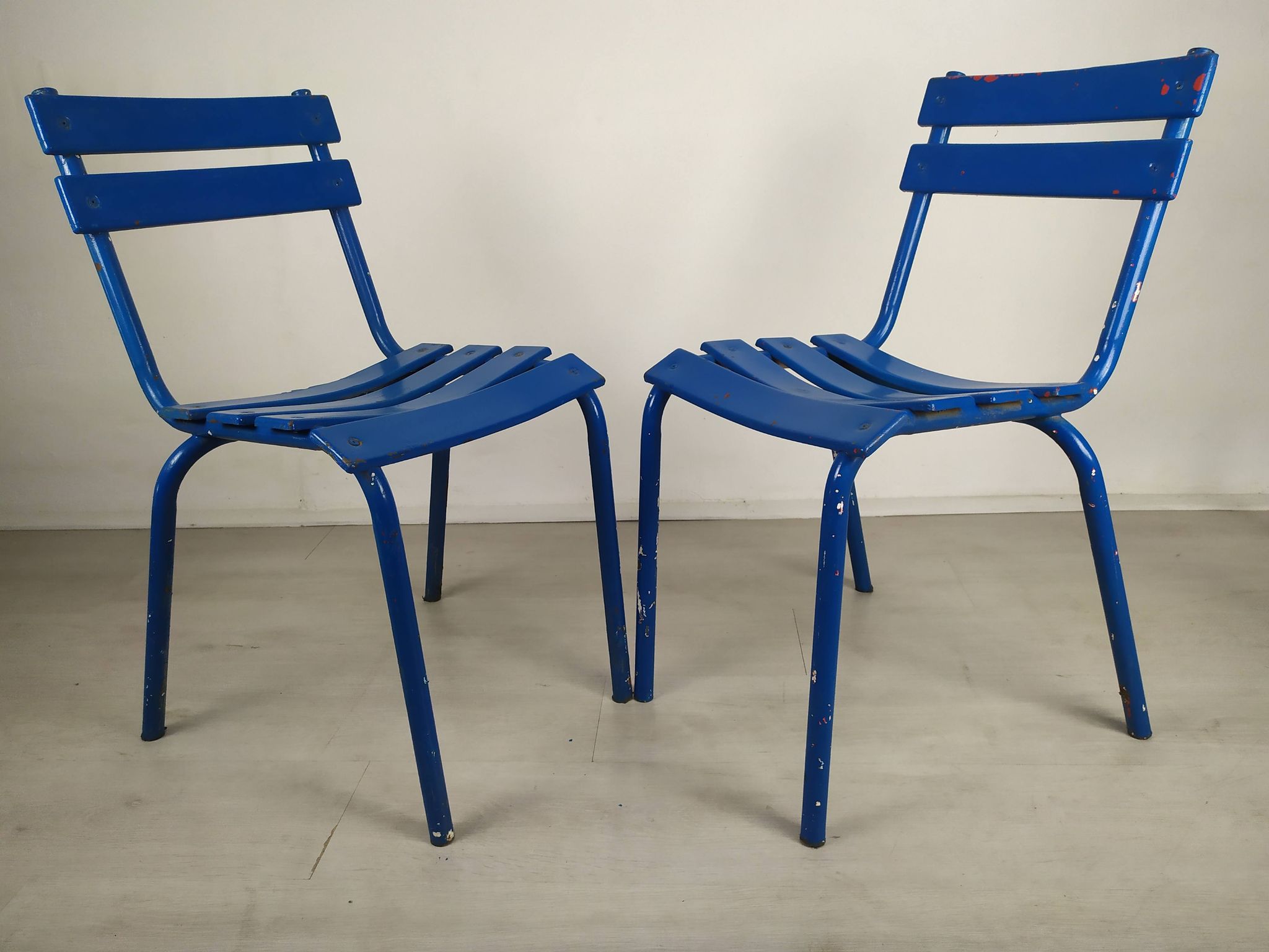 14 blue metal bistro chairs