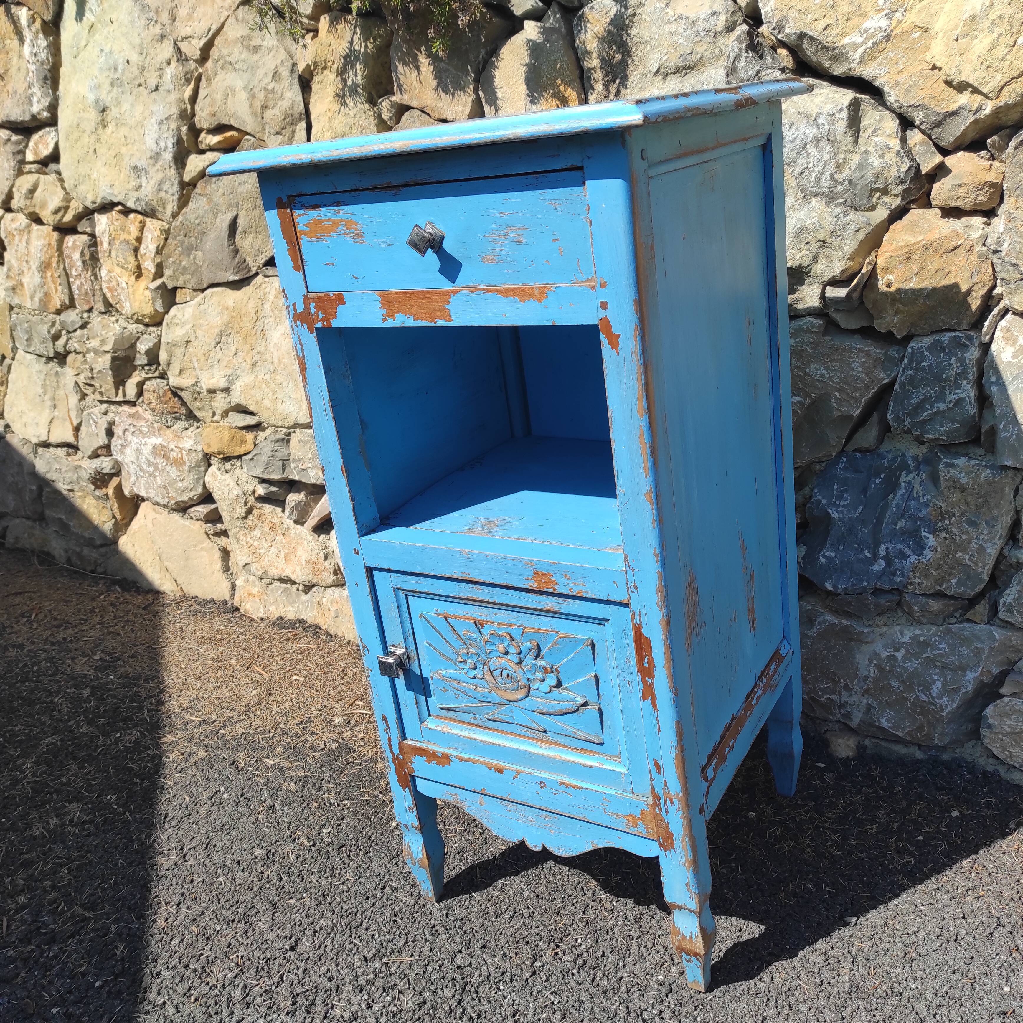 Old bedside table with 1 drawer and 1 door painted in lavender blue
