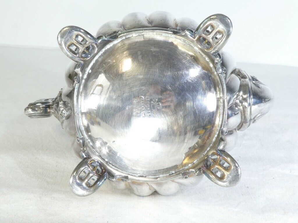 Silver flat silver metal teapot