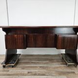 Executive Art Decò desk in exotic wood, glass, and brass