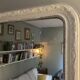 Antique Louis-Philippe mirror with pearls and shells, white patina.