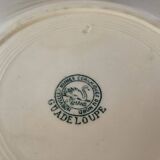 Four old earthenware plates