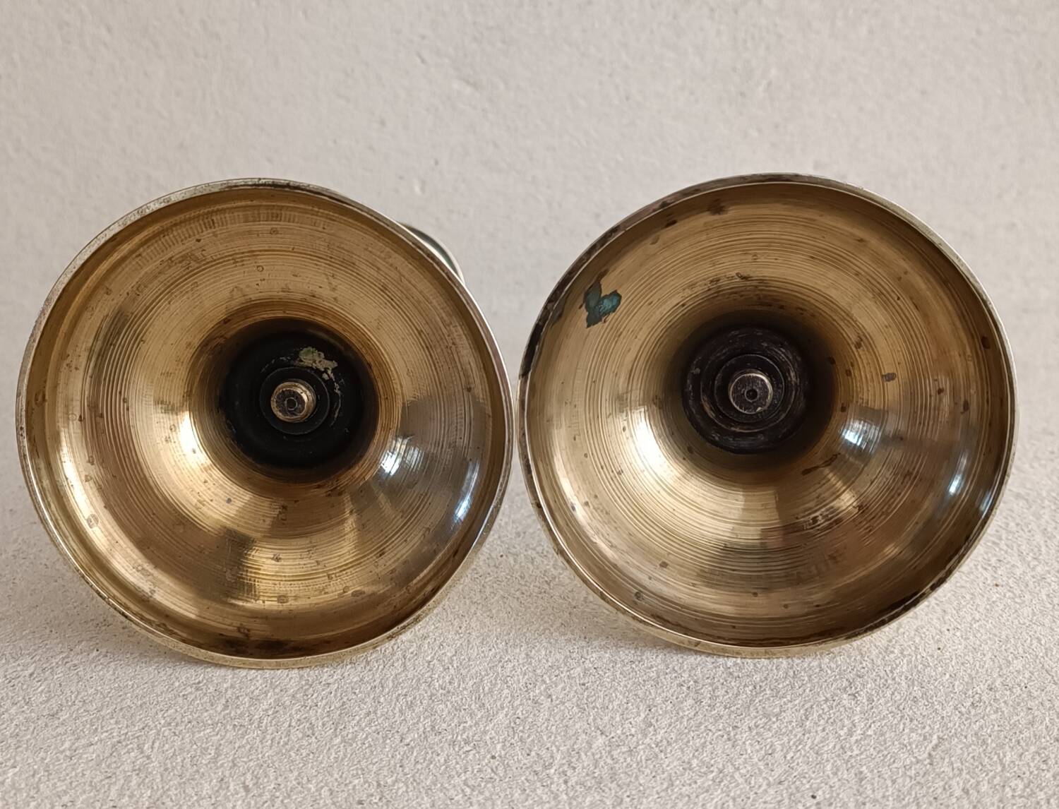 Pair of yellow copper candlesticks